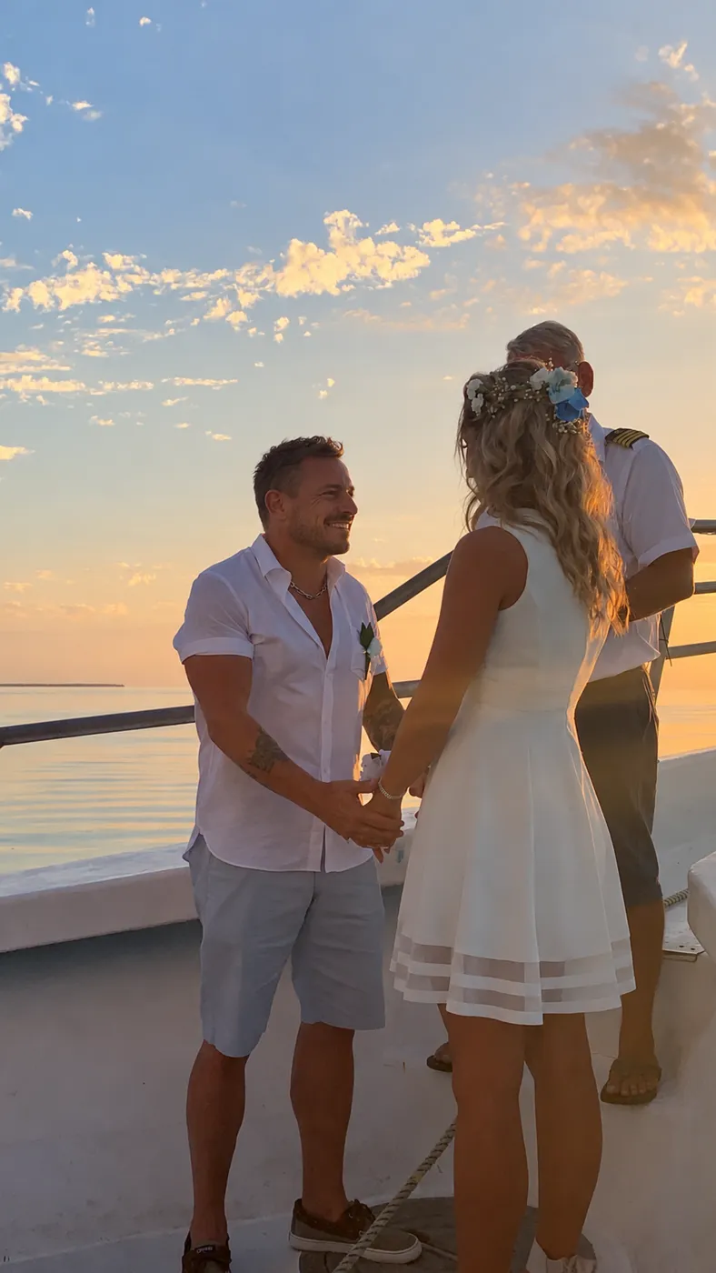 Couple exchanging vows during a wedding ceremony aboard a boat in Key West